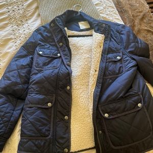 Navy blue fur lined thread and supply coat